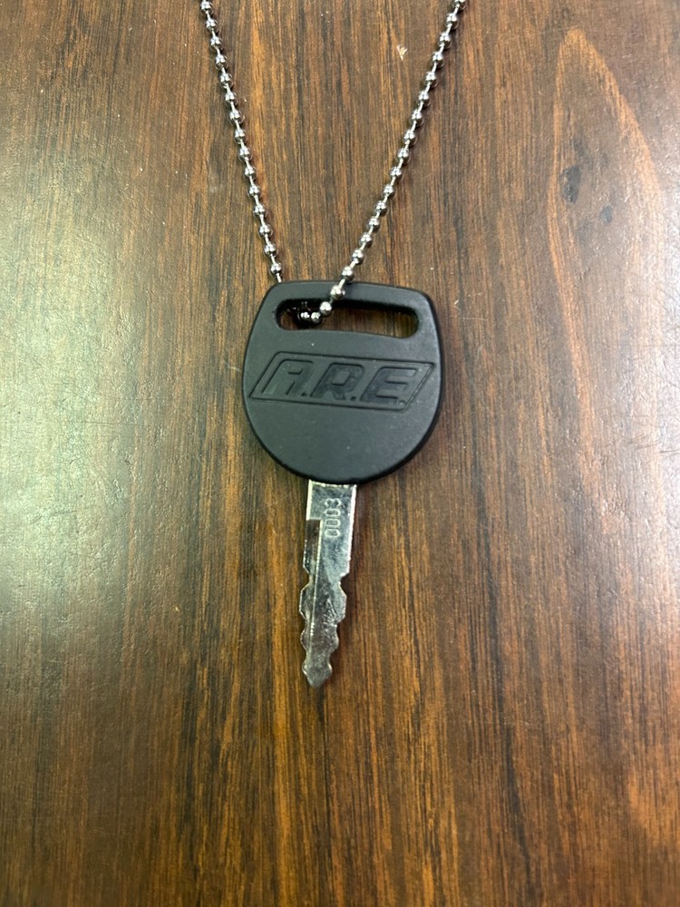 A.R.E. Truck Cap Key #0003