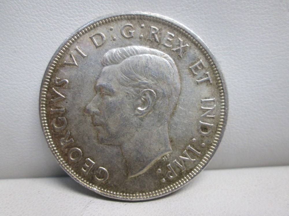 1947 CANADIAN SILVER DOLLAR- HIGHER GRADE- POINTED 7