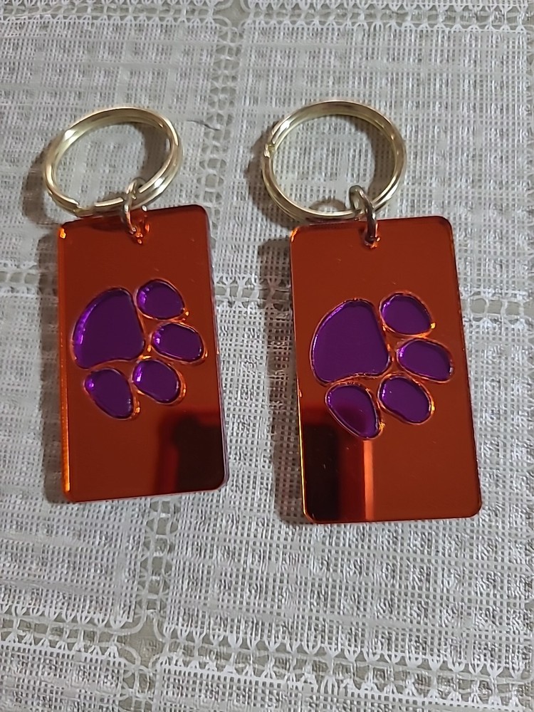 TWO TIGER KEY CHAINS WITH MIRROR ON THE BACK