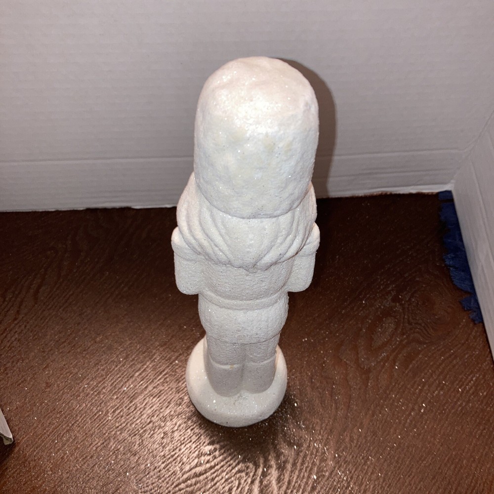 Christmas Ceramic Decor White glitter 10inx2 3/4in nutcracker soldier