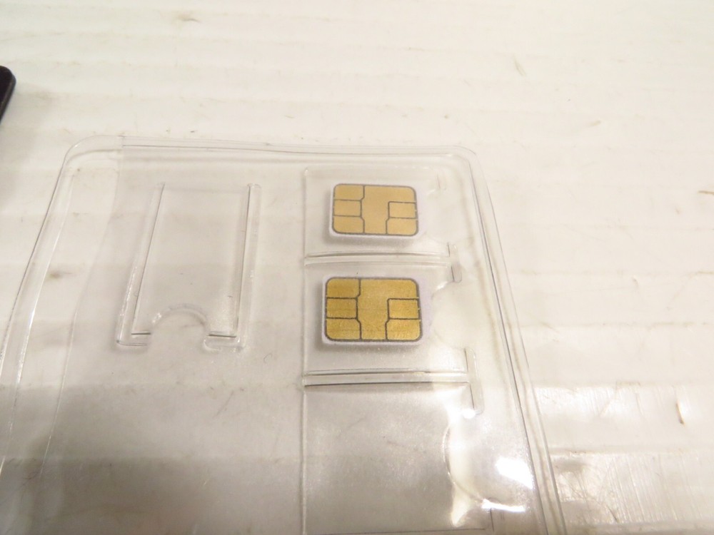 Universal Sim Card Adapter w/ 2 Vodafone Sim Card (Unknown Regine)