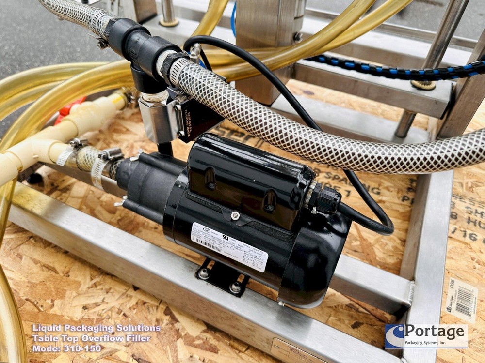 Liquid Packaging Solutions Model: 310-150 || Semi-Automatic Table Top Overflow