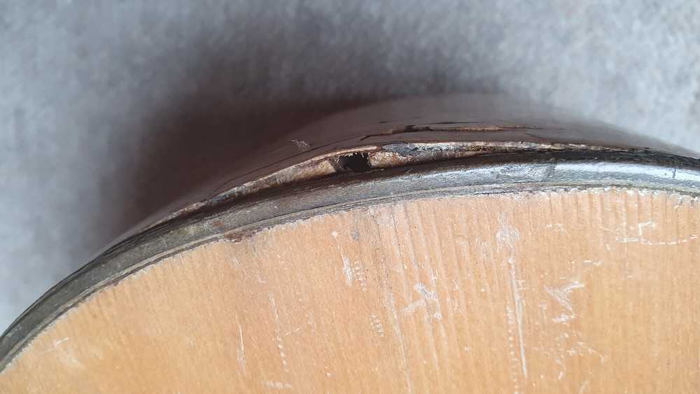 old mandolin, needs repair