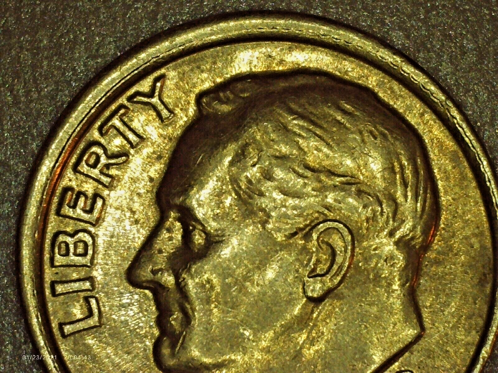 1989-P Roosevelt dime collar/rim error. 450