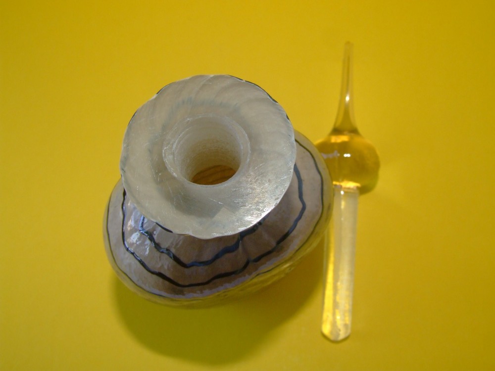 A Glass perfume Bottle with Stopper