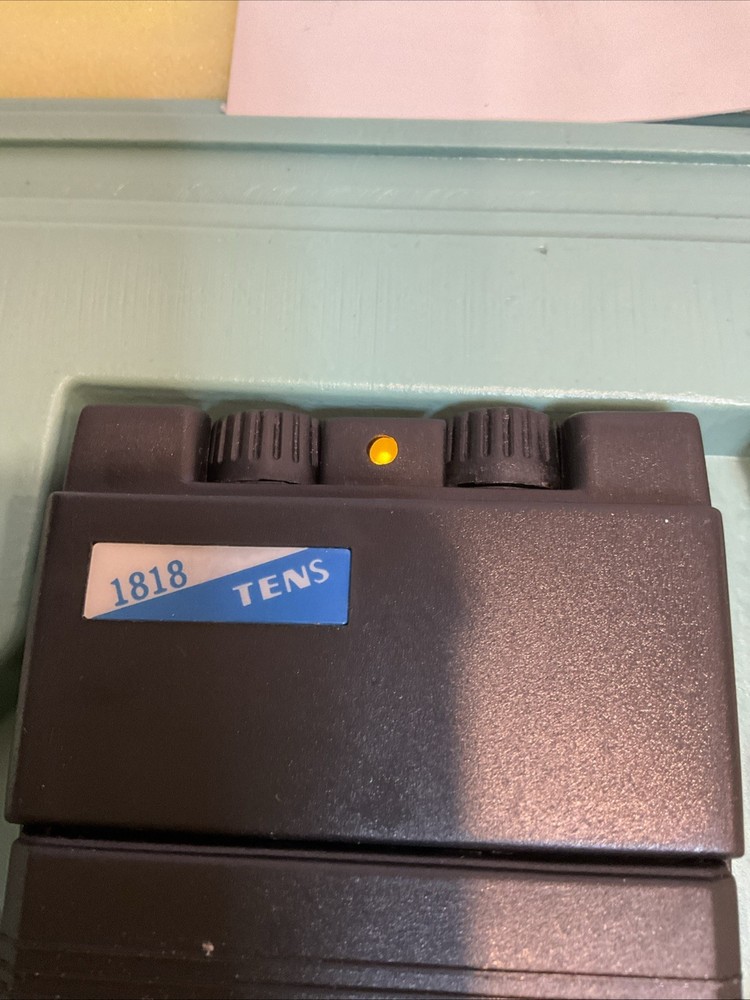 TENS (Transcutaneous Electrical Nerve Stimulation) unit kit, model 1818 Works