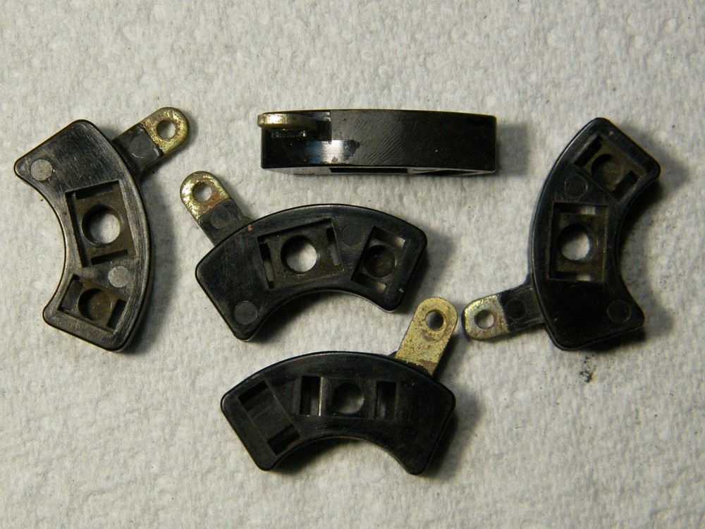 Suzuki GT750 headlight beam switch contact shuttle.