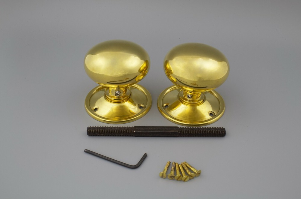 A pair of Solid Brass 65mm Unlaquered Victorian Brass Door Knobs Internal Handle
