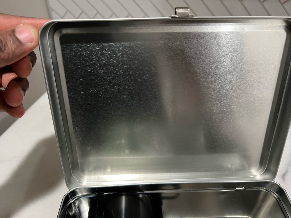Wing-stop lunch box with drink flask.