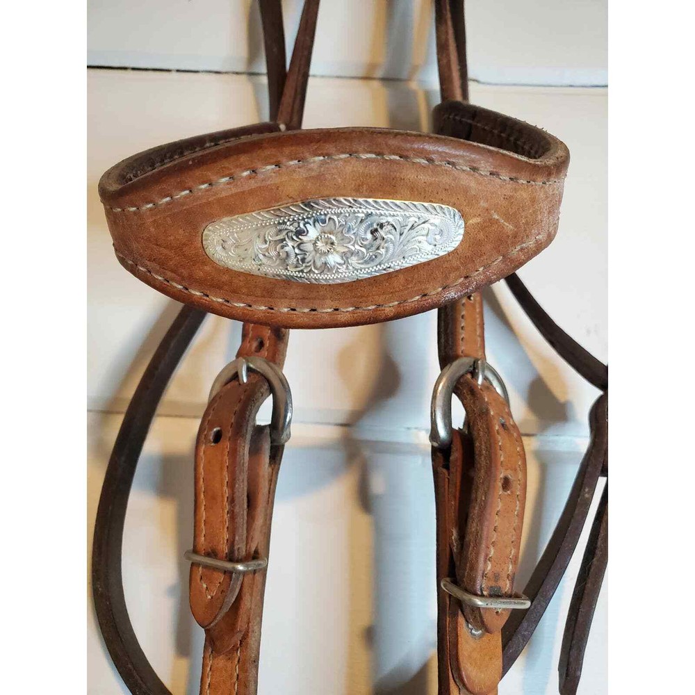 Headstall with snaffle bit and silver inlay