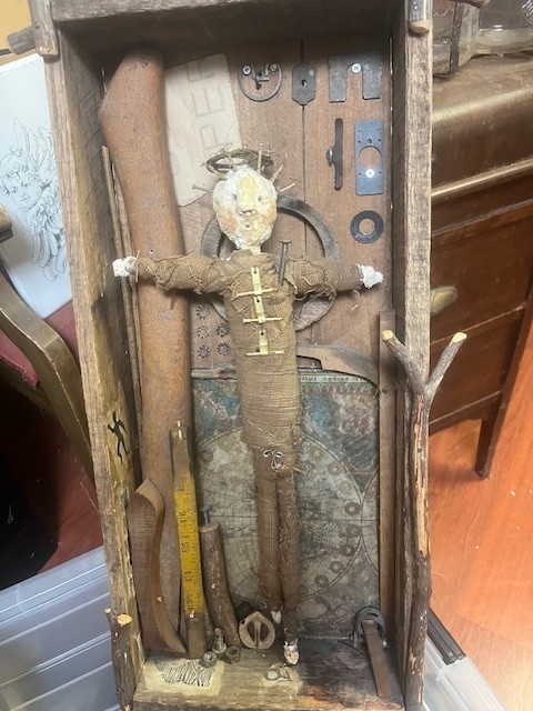Mixed Media art piece within a box frame.