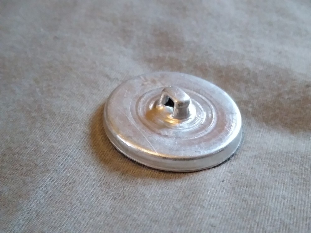 4 Vintage Junque Deco Plastic On Metal Buttons.
