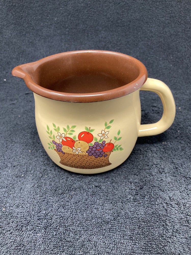 FTD metal pitcher flower pot
