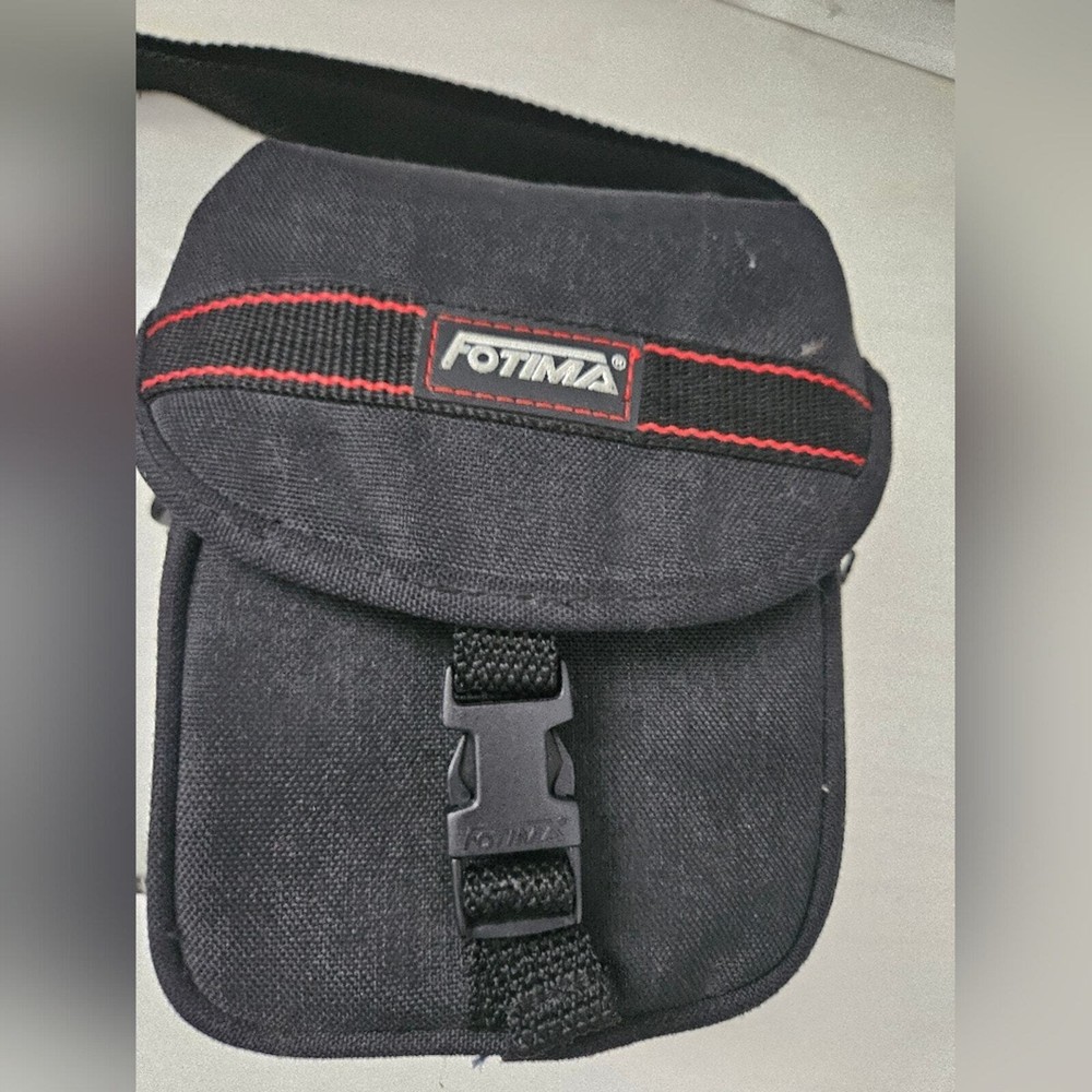 Fotima black camera carrying case model no. 60C with strap and pockets