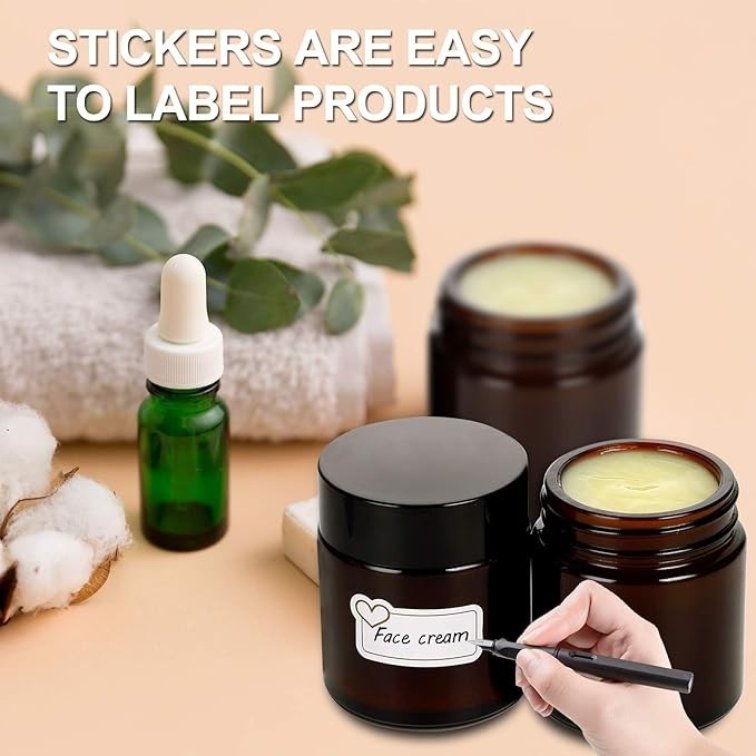 24 Pack 2oz Amber Glass Jars with Black Lids, Round Empty Containers for Scrubs