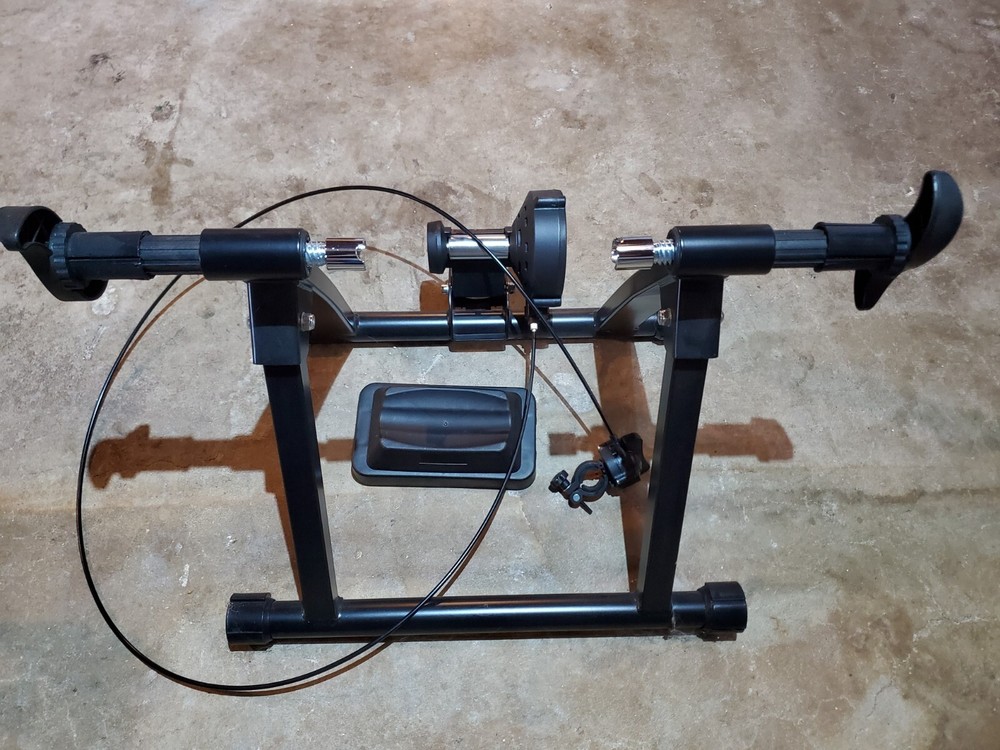Indoor exercise bicycle trainer stand, black. Never used.