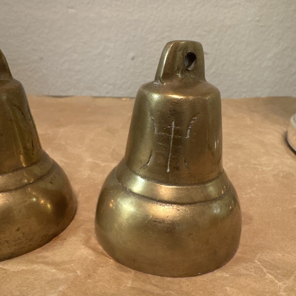 Vintage Brass bells with etchings x 2. Both missing clappers