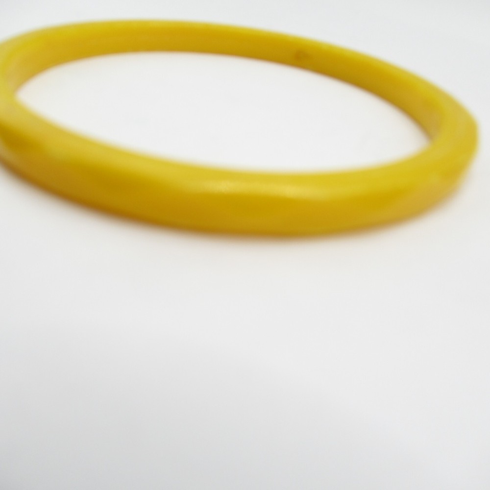Gold Tone Thin Plastic Bangle Bracelet Multifaceted 'Diamond' Shape Exterior
