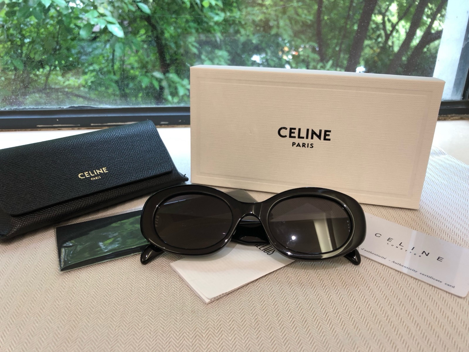 Celine CL40194U Triomphe Oval Sunglasses Black Frame Dark Grey Lens Women