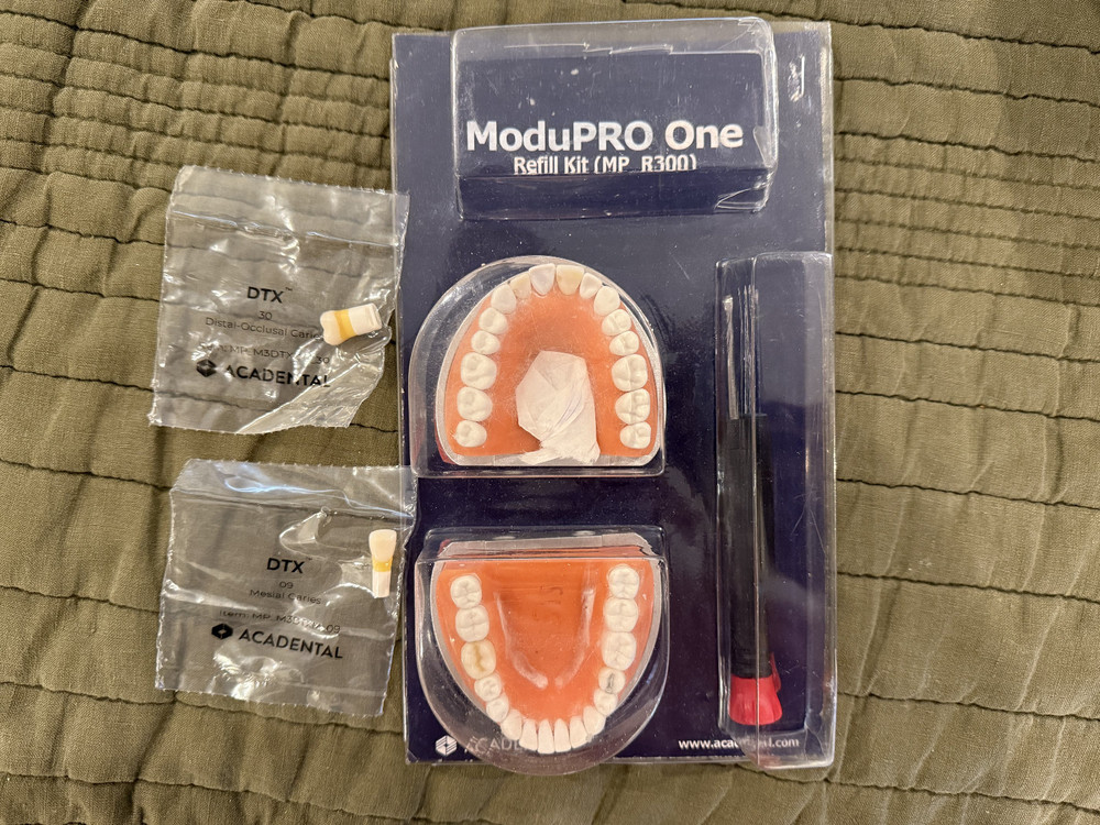 modupro one refill kit R300 with TWO caries simulated teeth