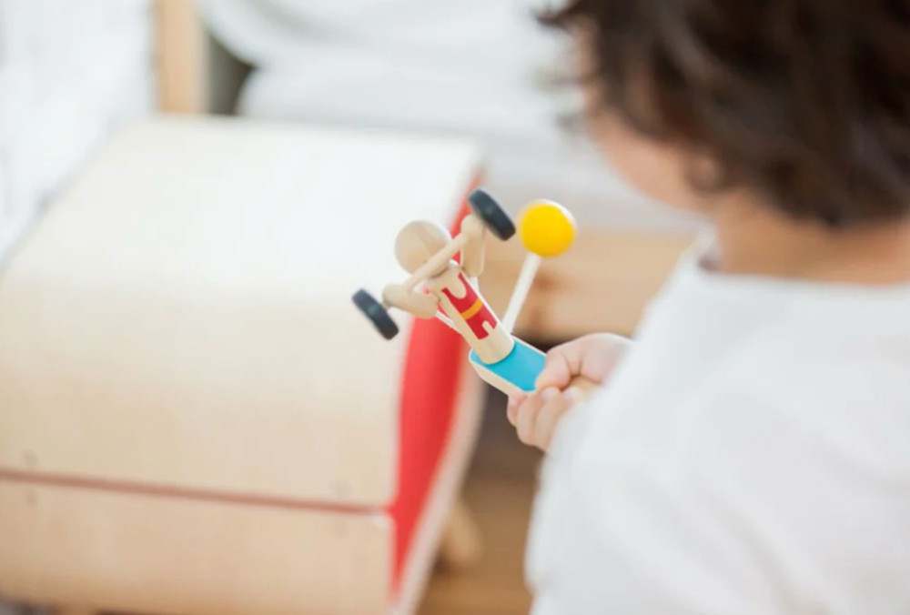 Plan Toys Weightlifting Acrobat. Eco-friendly.
