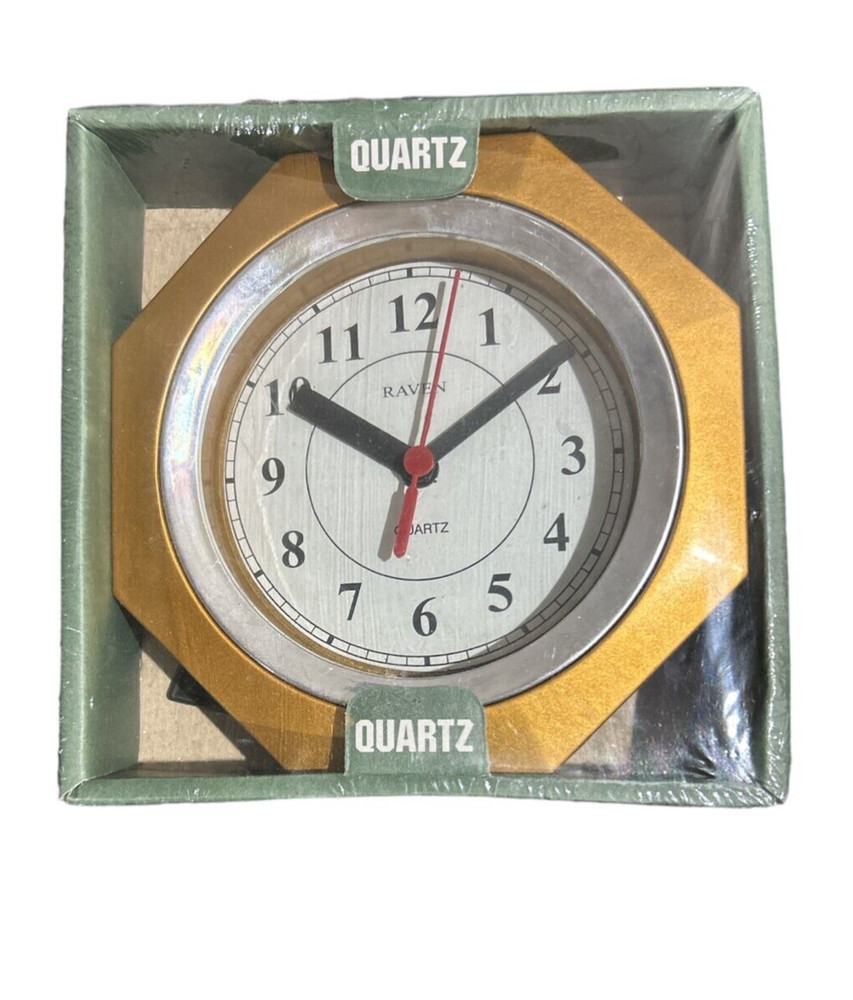 Raven Quartz Wall Clock - Gold Color