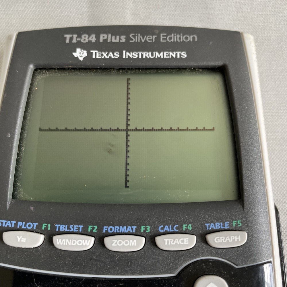 Texas Instruments TI-84 Plus Silver Edition Graphing Calculator pre-owned