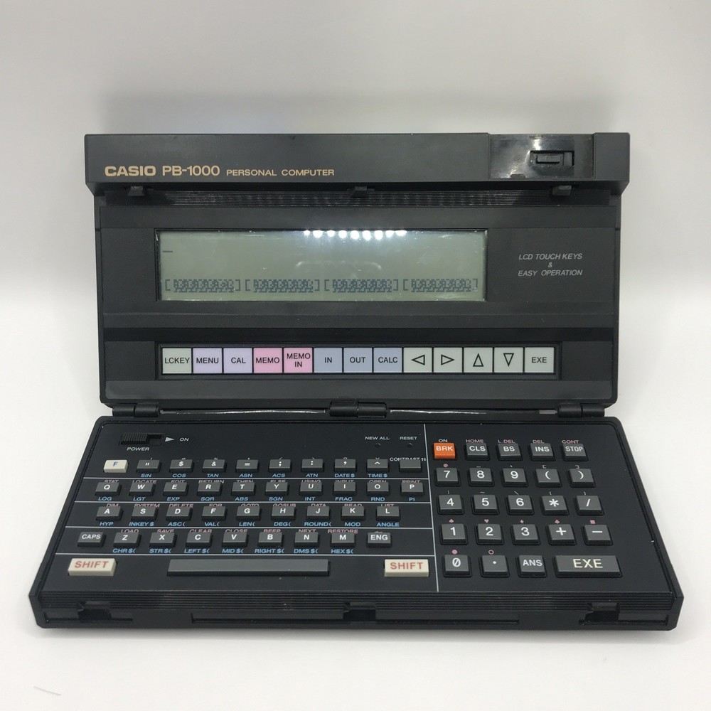 CASIO PB-1000 POCKET PERSONAL COMPUTER TURNS ON (NEEDS REPAIR)