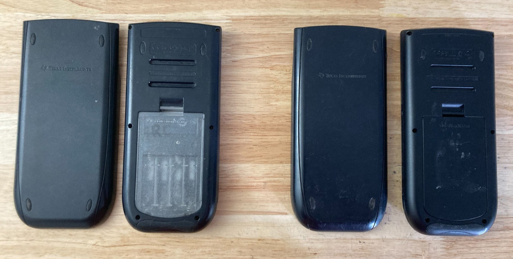 Two (2) Texas Instruments TI-84 Plus Graphing Calculators with Covers (Tested)