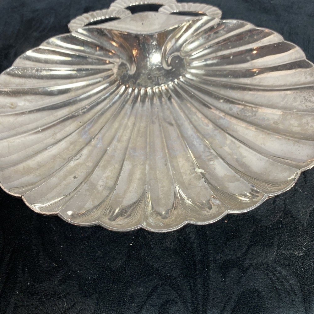 Scallopped edge silver colored dish