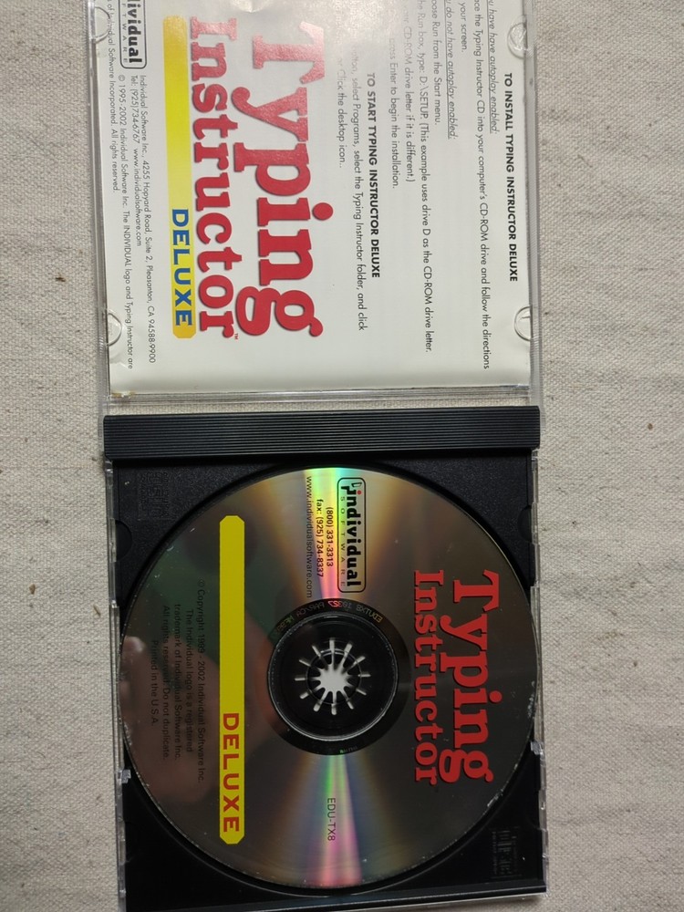 Typing Instructor Deluxe.( 2002 Individual Software).