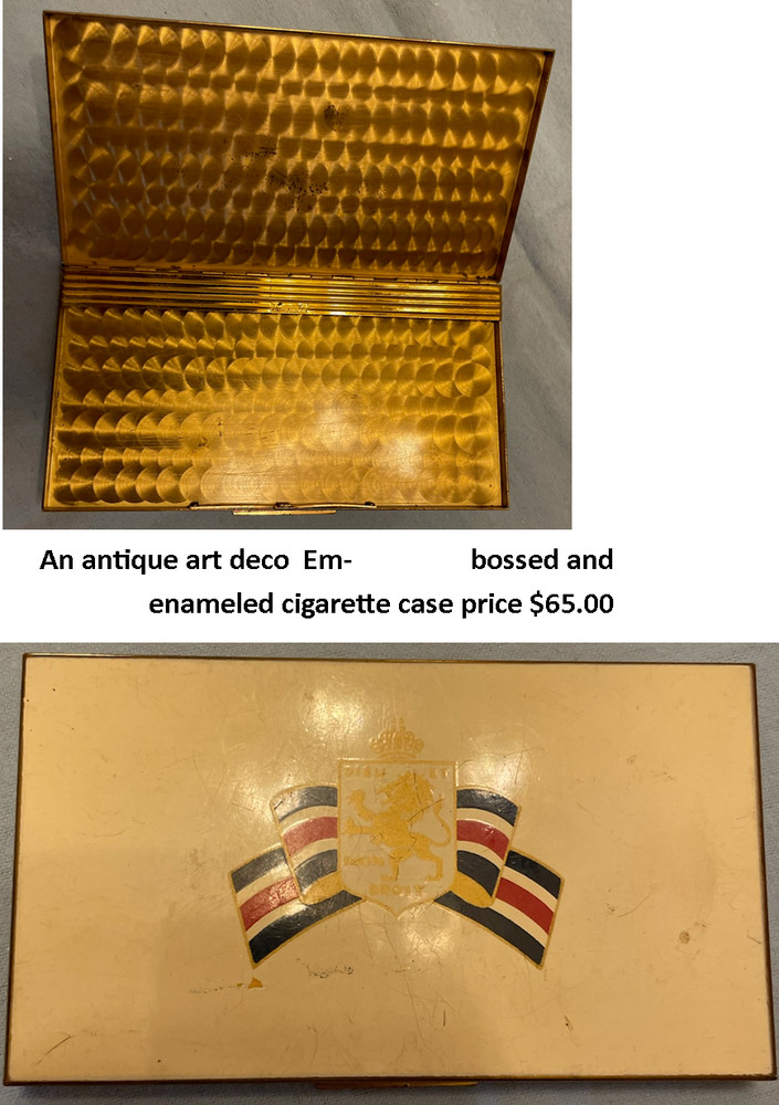 An antique Art Deco  Embossed and Enameled Cigarette Case