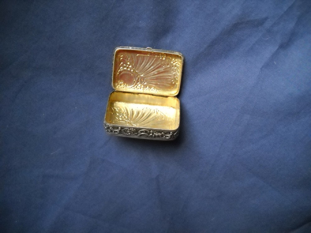 Antique silver rectangular snuff box gilt interior , 2" x 1 1/4". (read)