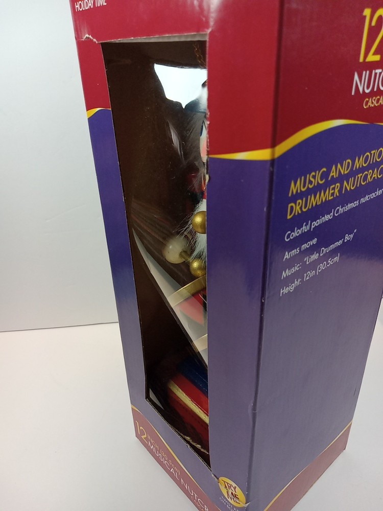 12" Musical Nutcracker. Music And Motion Twist Key.