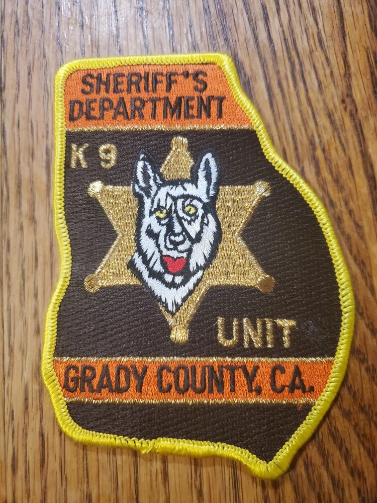 K-9 unit patch is from the Grady County Sheriff's Office in GA (TYPO ON PATCH)