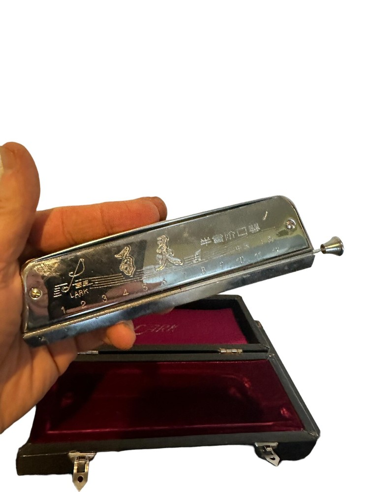 vintage lark harmonica with case