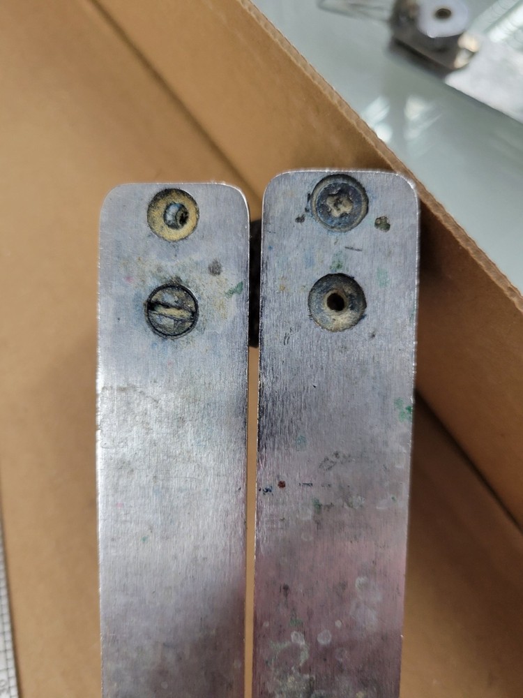 AB Dick feeder plate spring guide and thumb screw nut.