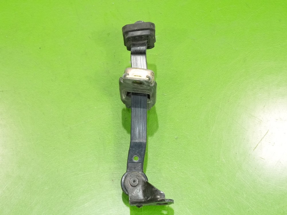 02-06 RSX OEM driver left door detent stop strap check
