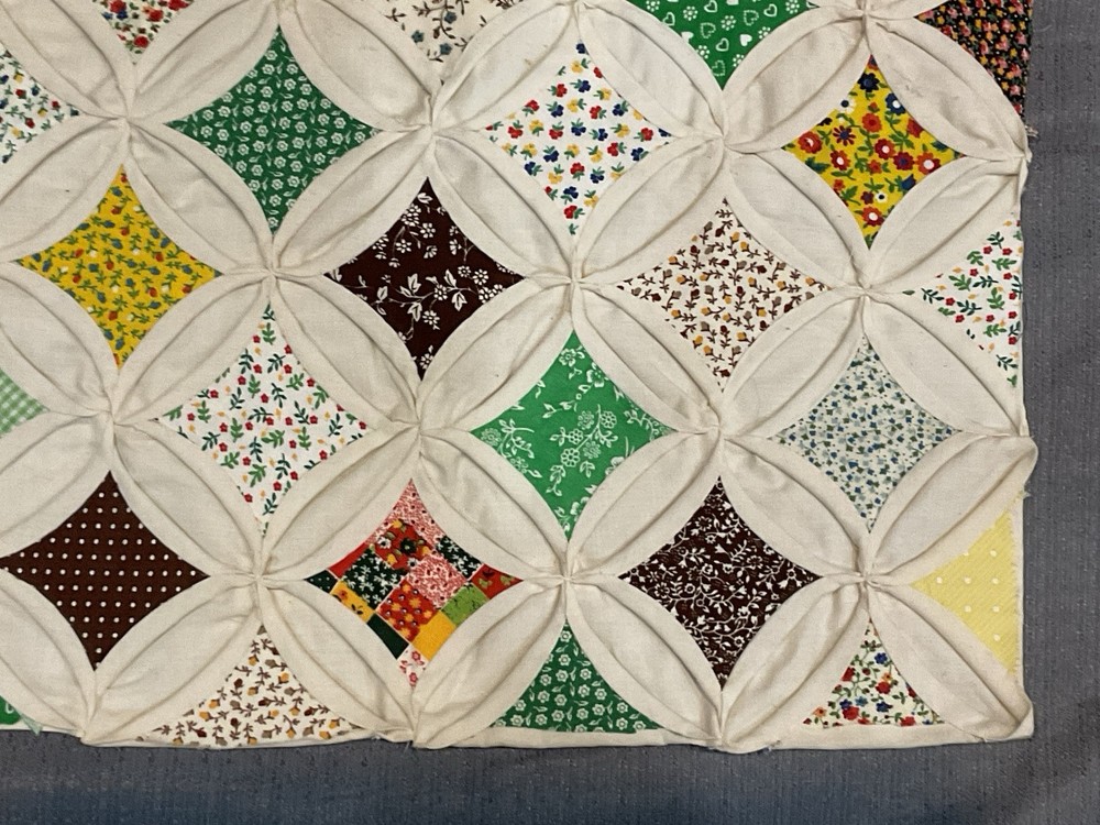 Cathedral windows wall quilt