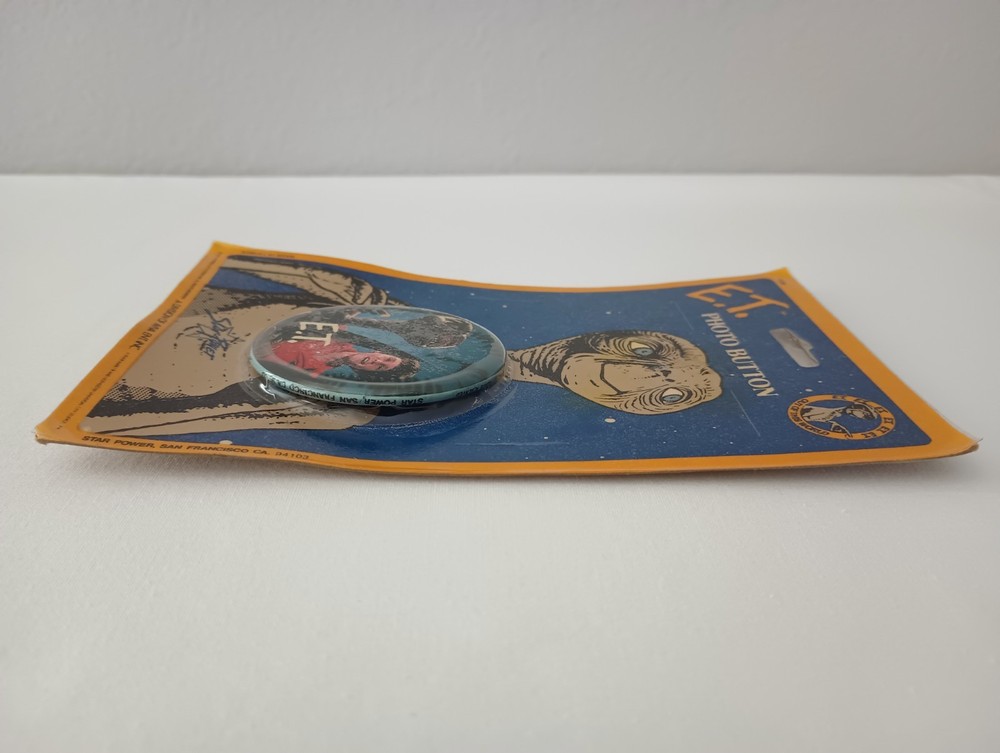 1982 E. T. Photo Button New in Package & Mechanical E.T. Plastic Figure