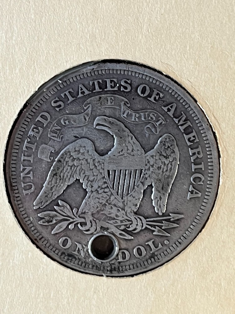 1869 Seated Dollar