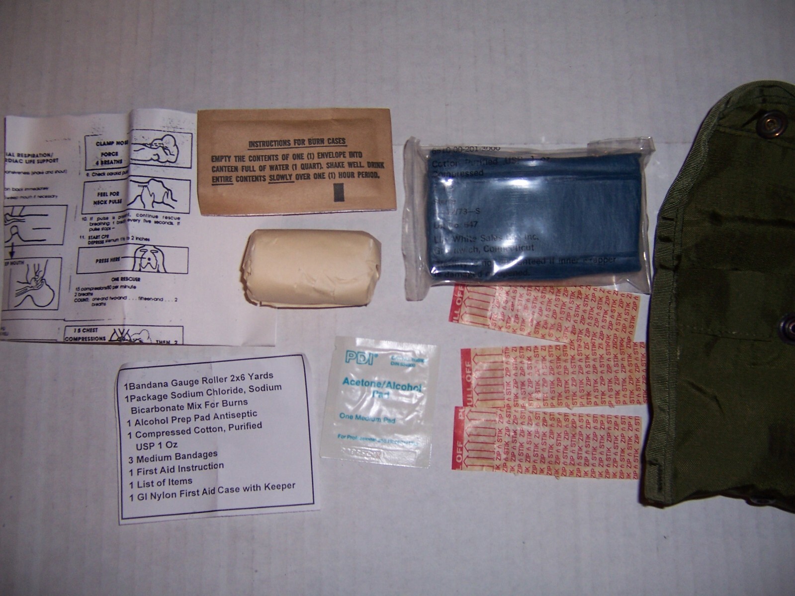 Four New complete Nylon First aid kit US military genuine GI surplus small