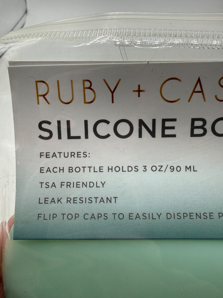 Ruby + Cash Silicone Bottle Set 2 Piece Set TSA Friendly