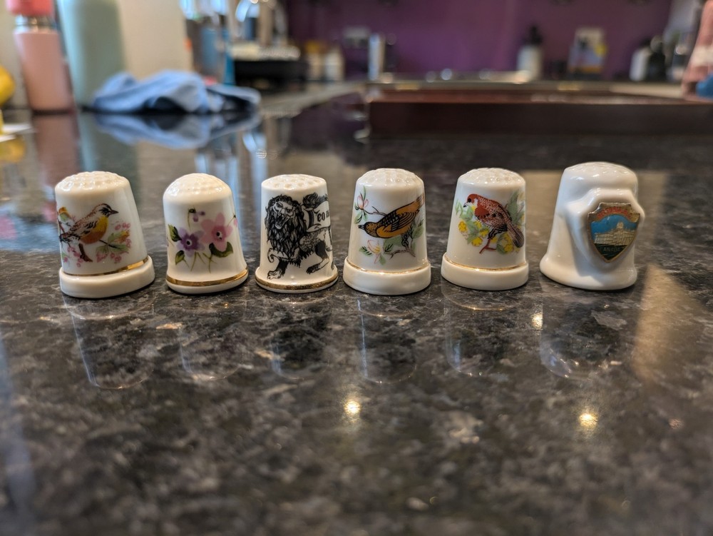 48 Decorative Thimbles in Display Case