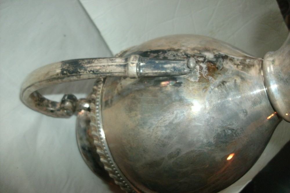 VINTAGE SILVER ON COPPER PITCHER, ENBLEM ON BOTTOM, 9 1/2" TALL