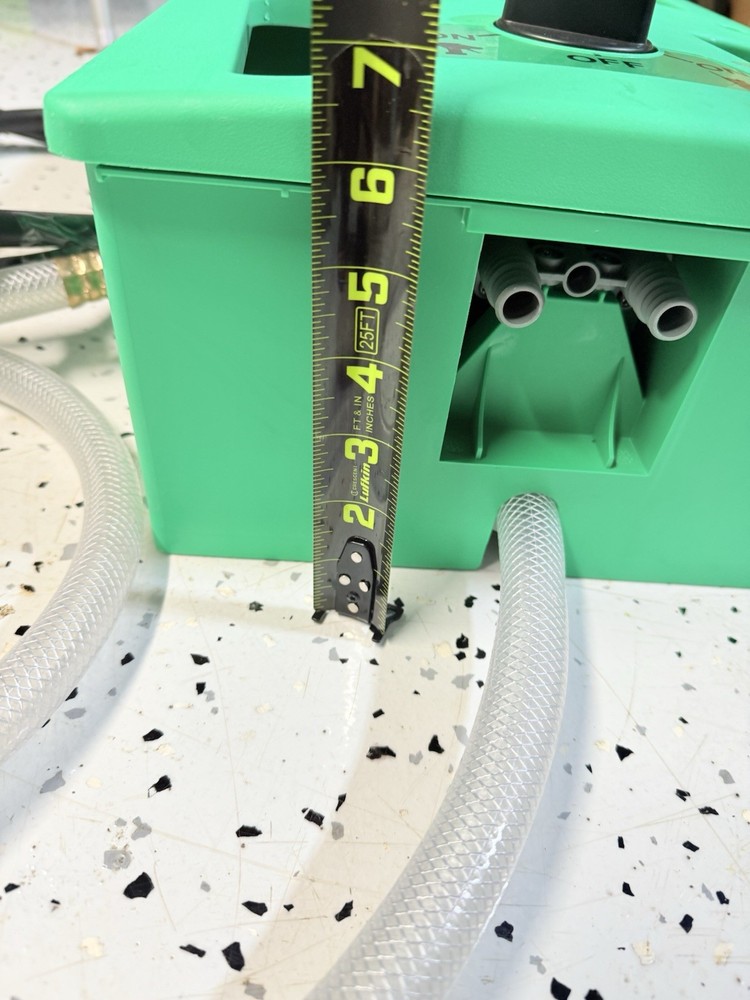 3M Flow Control System chemical dispenser, a wall-mounted.