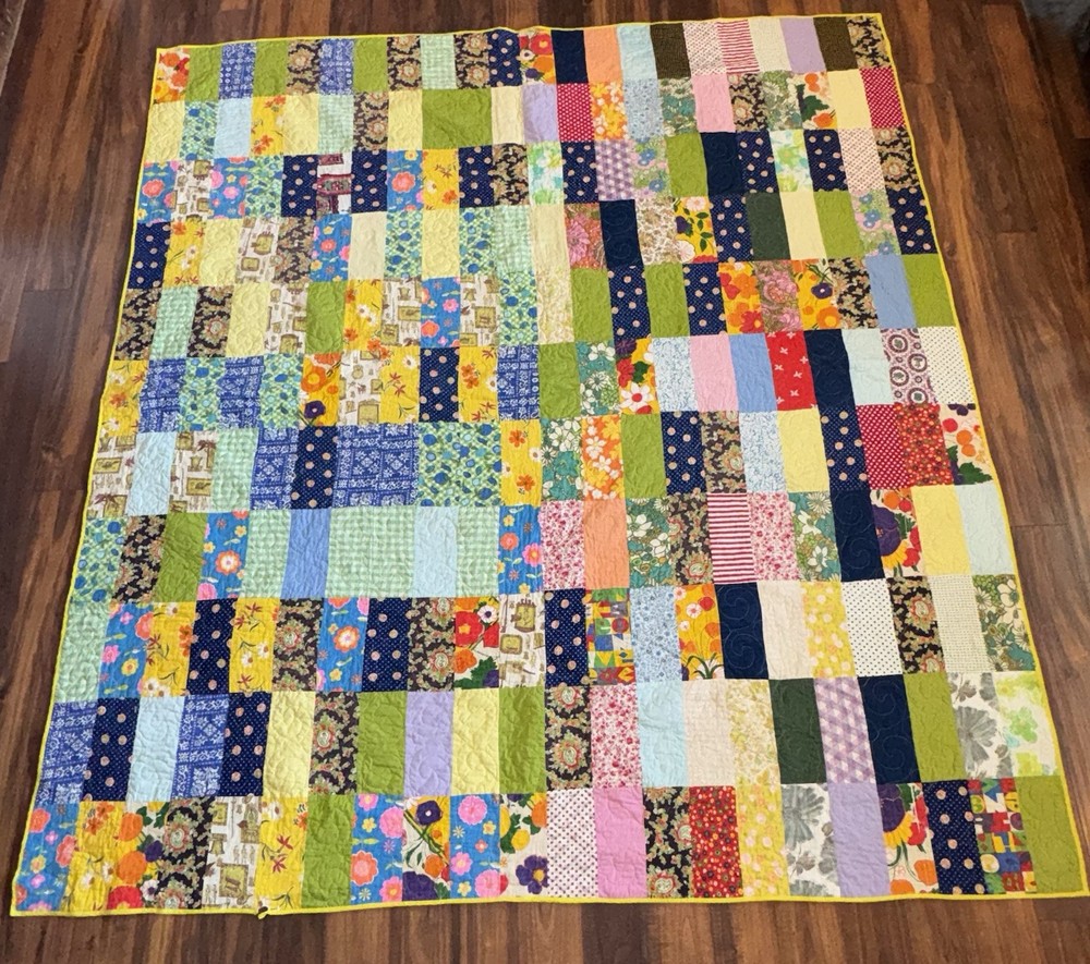 handmade multicolored cotton patchwork quilt featuring a reversible design7by7.5