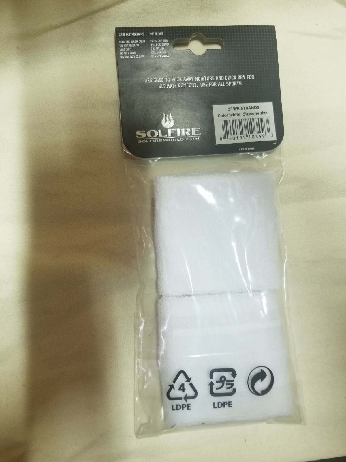 New Solfire Athletic Sweat Wristbands. White With Black Flame.