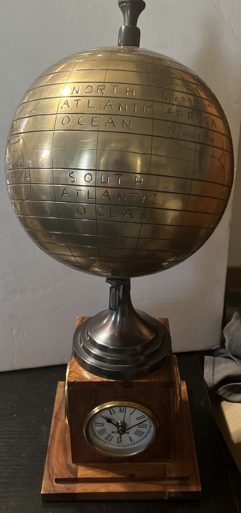 Bains Kushnick Clock Globe