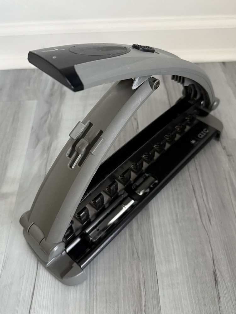 Staples Arc System Adjustable 11 Hole Punch